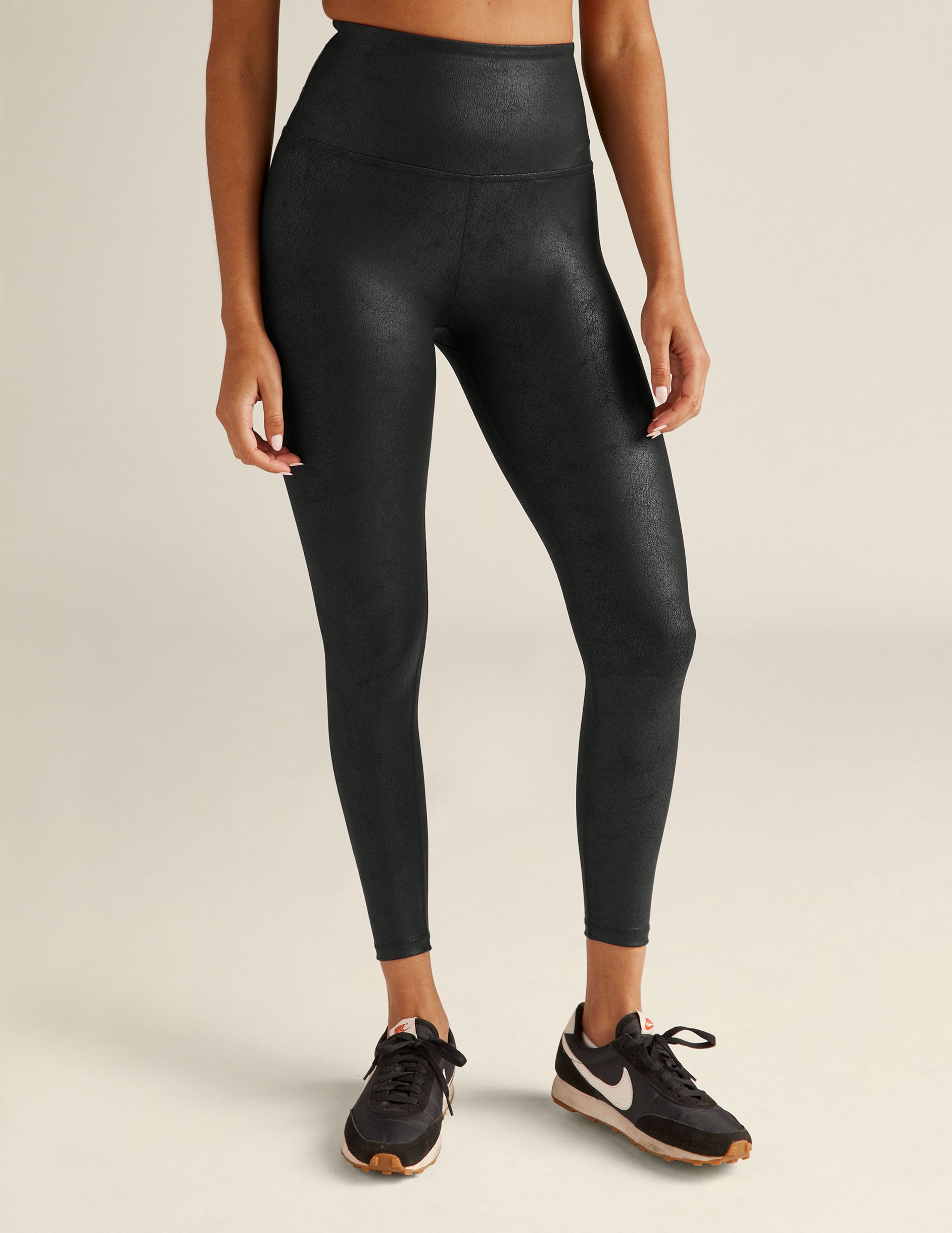 black leather high-waisted midi leggings. 