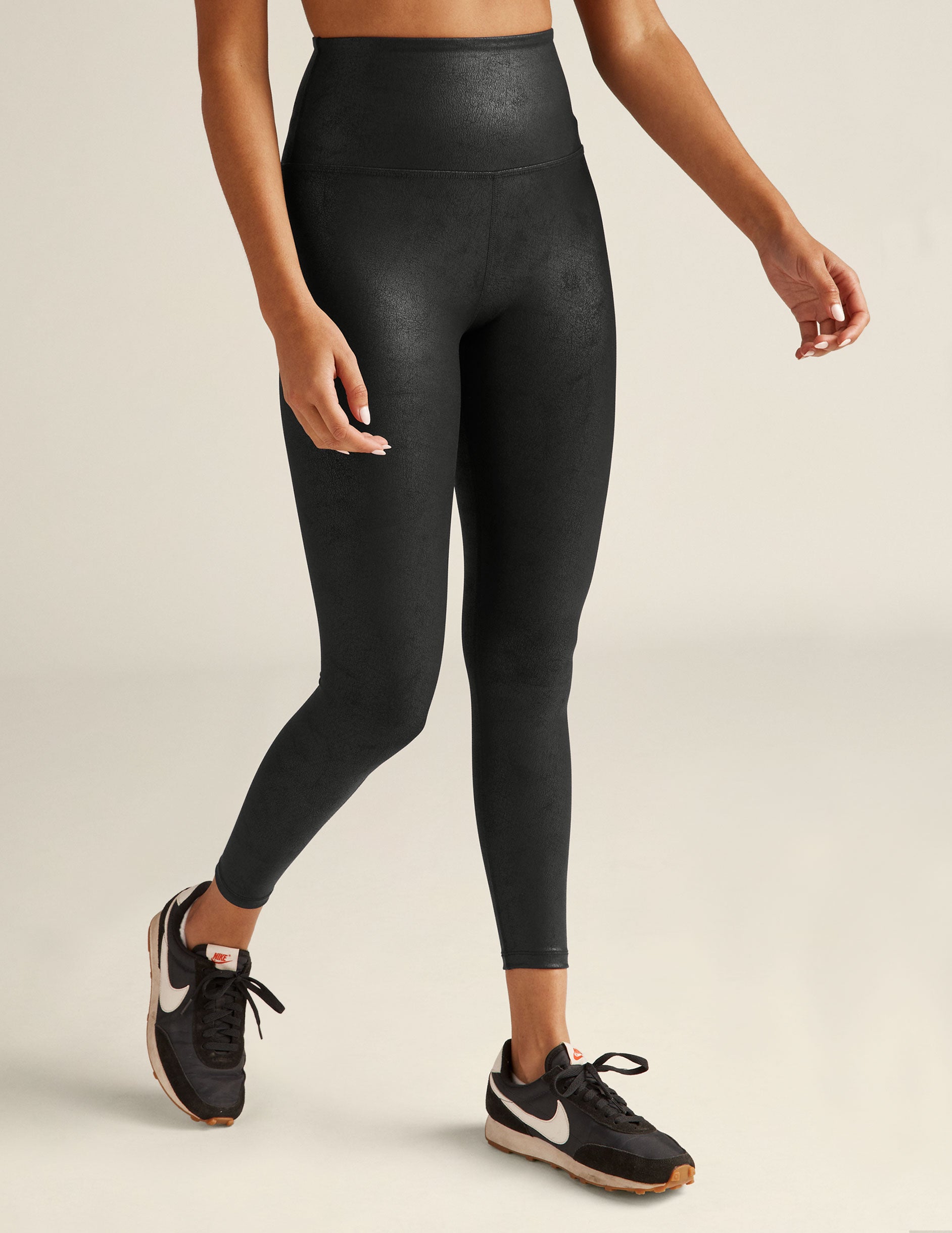 black leather high-waisted midi leggings. 