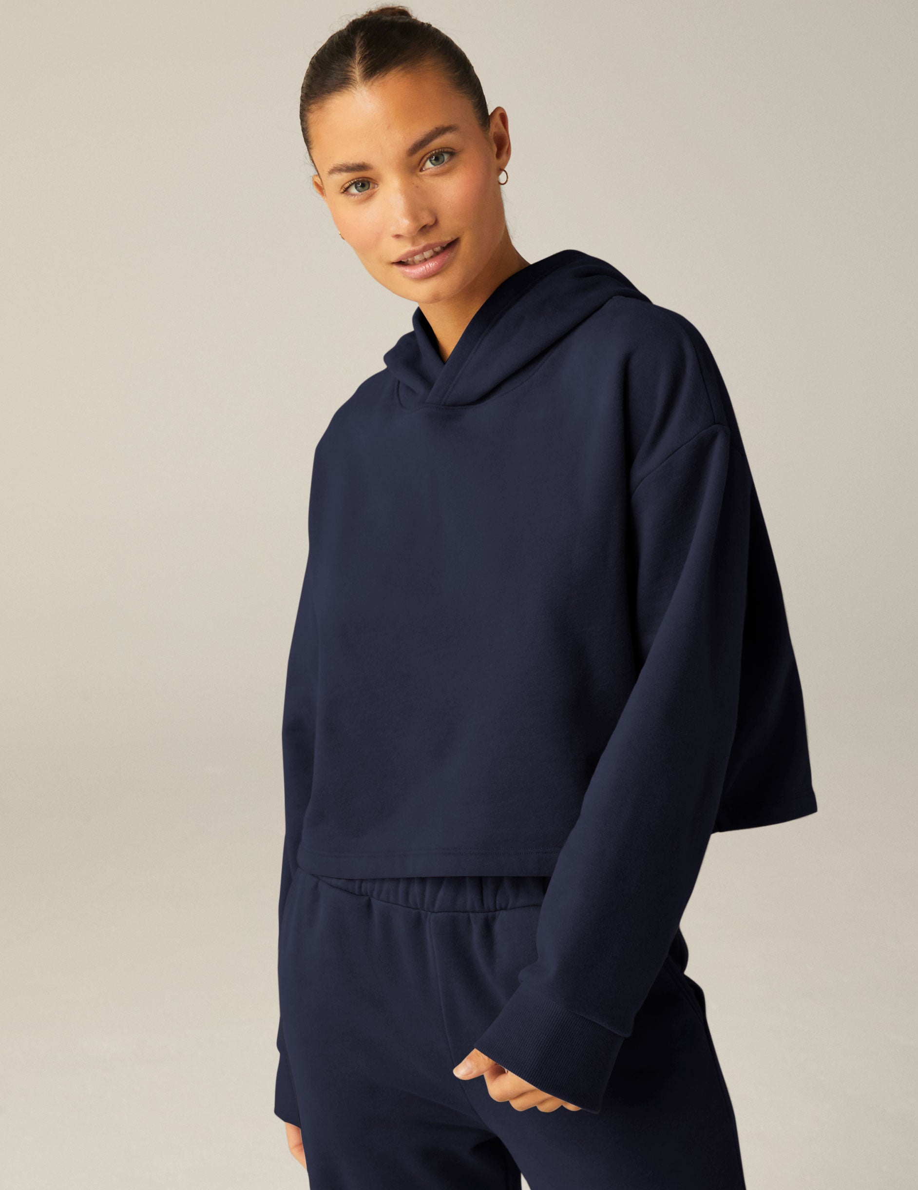 blue cropped hooded pullover. 