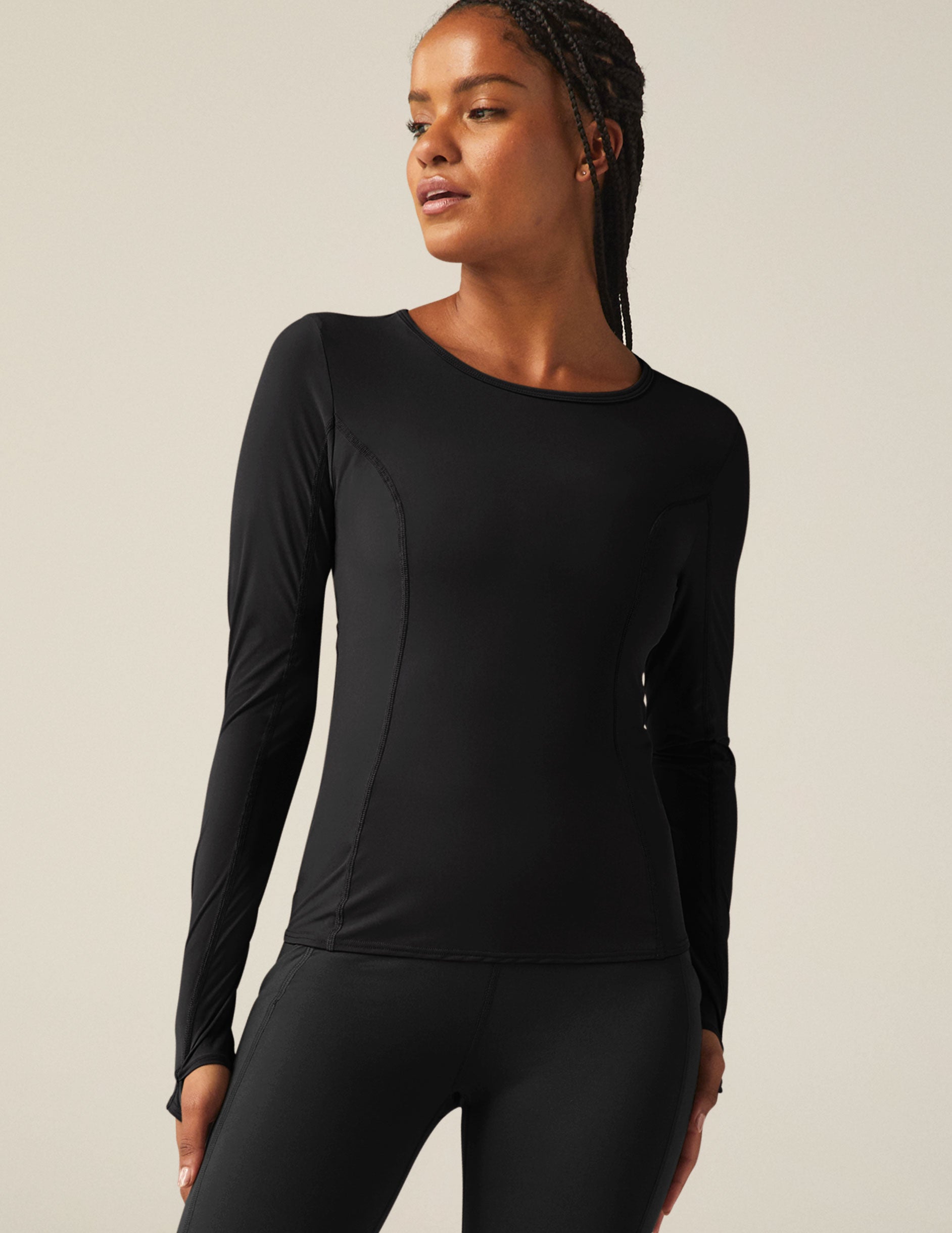 black powerbeyond lite long sleeve top with thumb holes. 