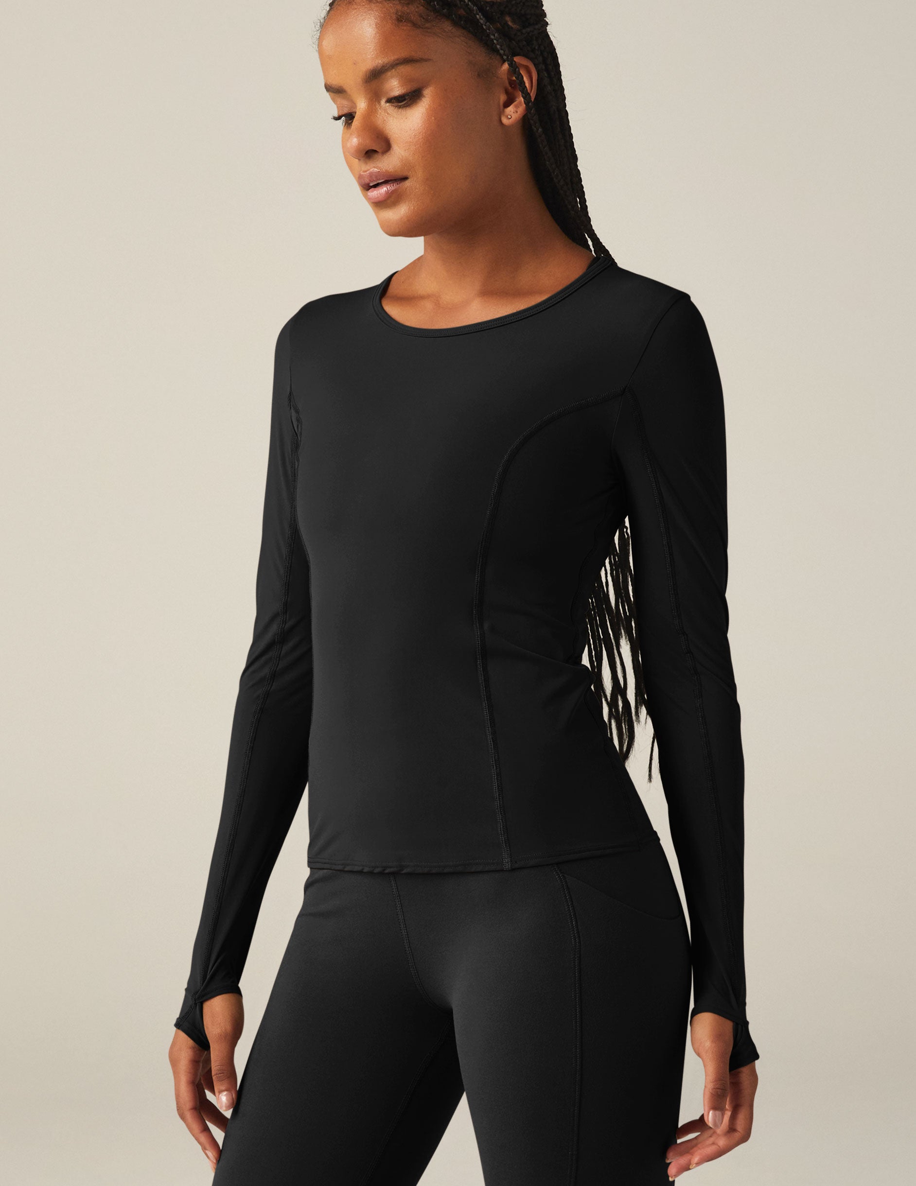 black powerbeyond lite long sleeve top with thumb holes. 