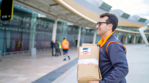 man delivery package at airport