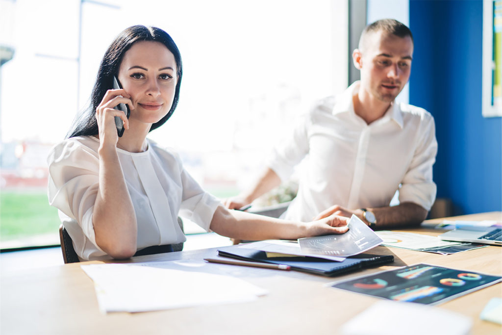 Happy confident workers meeting