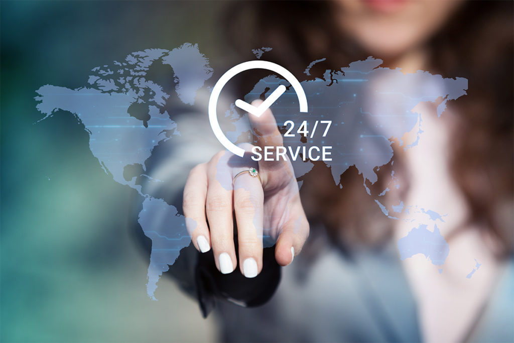 businesswoman pressing 247 support service button