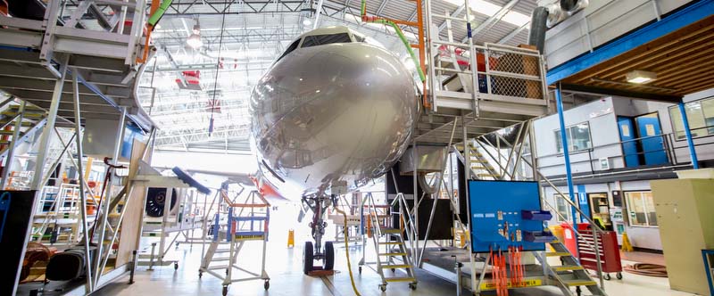 plane being worked on in hangar