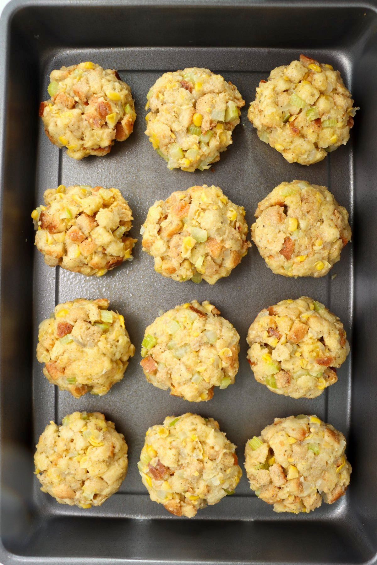 baking sheet filled with balls of Thanksgiving stuffing