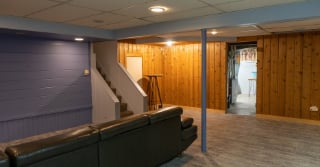 Interior view of partially furnished basement