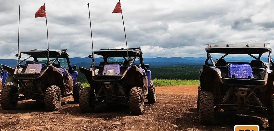 Three offroad vehicles lined up and ready for action.