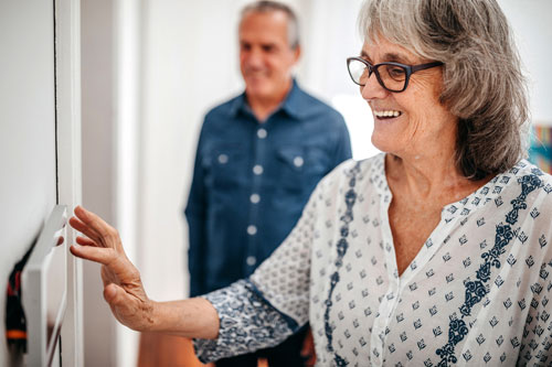 senior citizen enjoys intelligent home