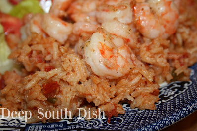 A Lowcountry dish with some of our familiar Deep South elements, and similar in some ways to our jambalaya, with a touch of flavor akin to a Spanish rice.