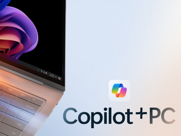 Laptop computer along with Copilot logo and text reading Copilot+ PC