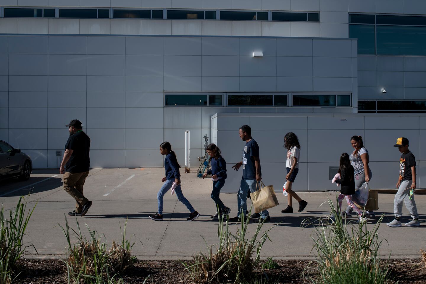 Migrants who had arrived by bus from Texas the night before were led by a nonprofit worker to the Denver Human Services building on June 5. In two years, Texas has bused more than 119,000 people to Democrat-led cities.