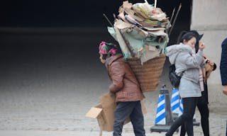 CHONG QING, CHINA - JANUARY 26, 2017: The gap of social mobility between the poor man and the middle class in china