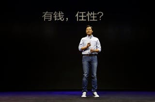 小米 雷軍 有錢就是任性 Lei Jun, founder and Chief Executive Officer of China's mobile company Xiaomi, speaks at the launch ceremony of the