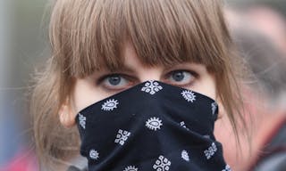 MOSCOW - MAY 1, 2011: Unidentified participant of marsh leftist in the center city. Thousands marched through Moscow to protest 