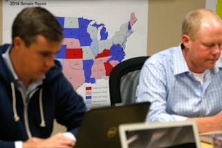 Republican National Committee team members prepare for their night's work before the polls close in the U.S. midterm elections, 