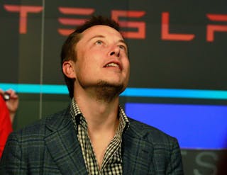 CEO of Tesla Motors Elon Musk reacts following the company's initial public offering at the NASDAQ market in New York