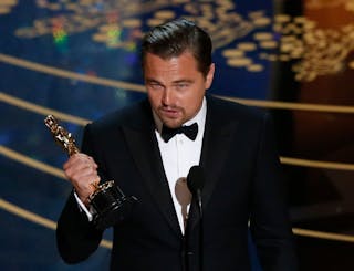 Leonardo DiCaprio accepts the Oscar for Best Actor for the movie "The Revenant" at the 88th Academy Awards in Hollywood