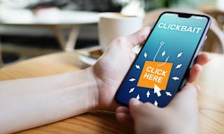 Clickbait, advertising, spam icons on mobile phone screen. Internet and business concept. - 圖片