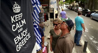 T-shirts on display in a shop in Athens, Greece