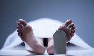 Close-up of human feet in the morgue