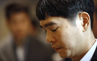 South Korean professional Go player Lee Sedol waits before entering the venue for the third match of the Google DeepMind Challenge Match against Google's artificial intelligence program, AlphaGo, in Seoul, South Korea, Saturday, March 12, 2016. (AP Photo/Lee Jin-man)