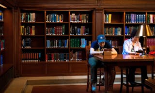 NEW YORK-APRIL 14: A parent and teenager study at the New York City Public Library on April 14  2014 in Manhattan. The New York 