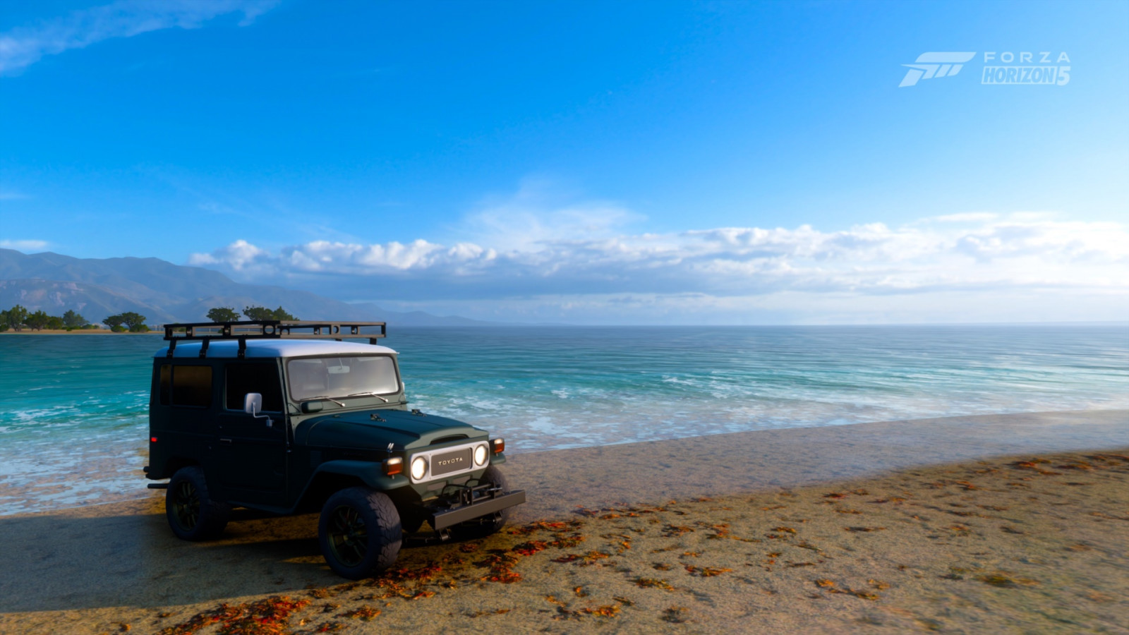 Wasser, Reifen, Himmel, Rad, Wolke, Landfahrzeug, Fahrzeug, Auto, Autoreifen, Haube, blau, Kraftfahrzeug, Strand, Automobilbeleuchtung, Automobil-Design, Automotive außen, Gewässer, Reise, coastal and oceanic landforms, Stoßstange, Fender, Roof rack, See, Automotive carrying rack, Sommer-, Landschaft, Horizont, Ufer, Sand, Hardtop, Kumulus, Sport Nutzfahrzeug, automotive wheel system, Küste, Aeolische landform, Ozean, Tropen, Geländewagen, Jeep, Berg, Tourismus, Windwelle, Off roading, Ferien, Autoteil, Straße, Rock, Rand, Kompaktes Sportfahrzeug, Familienwagen, Automobilfensterteil, Land Rover, Luxusfahrzeug, Regularity rally, Mini SUV, Meer, Erholung, Ausflug, Karibik