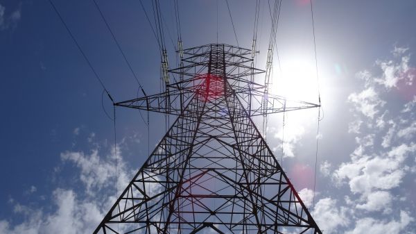 utility pole, power lines, water, sky, clouds, tower