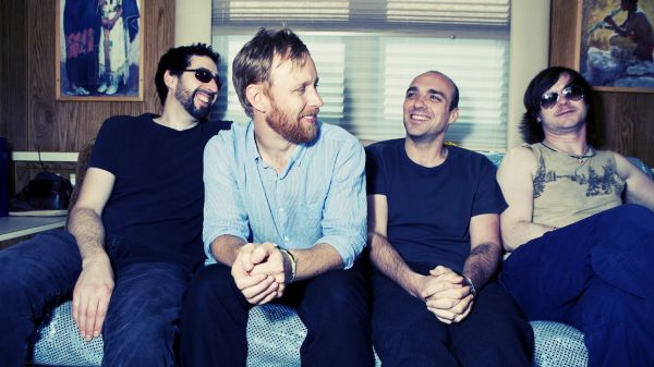 band,sunny day real estate,smile,couch,beard