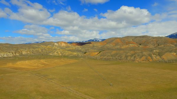 sky, ecosystem, highland, grassland, cloud, field