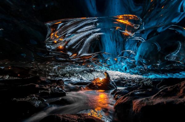 men,lights,water,rock,nature,reflection