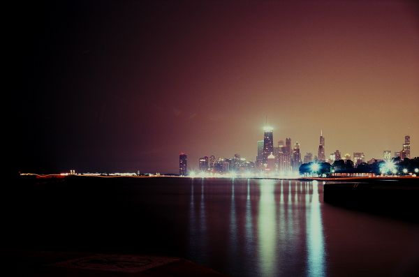 sunset,sea,city,cityscape,night,water