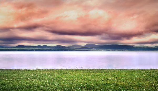 blue,lake,mountains,beach,water,grass