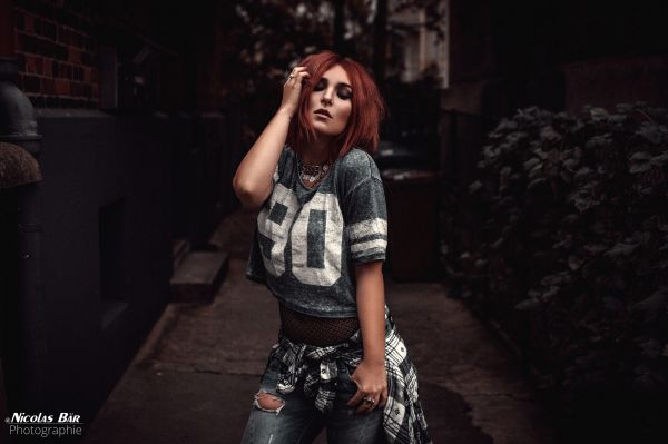 sports jerseys,women,portrait,torn jeans,redhead