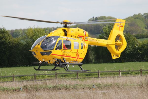 helicopter,helicopter rotor,rotorcraft,aircraft,yellow,mode of transport