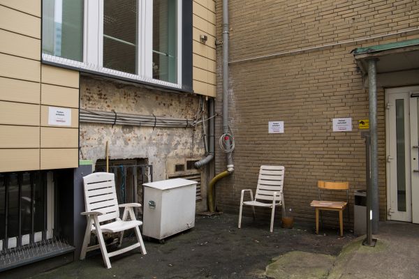 window,street,building,wall,house,chair