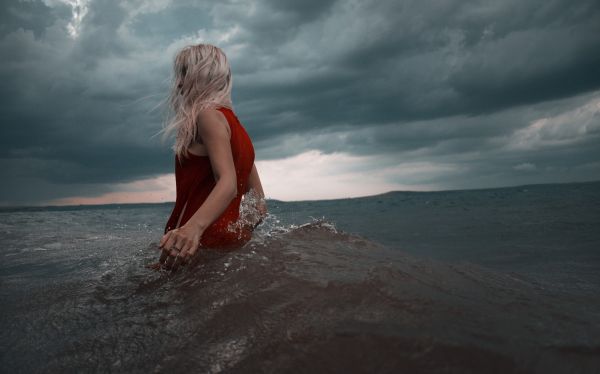 women,sunlight,blonde,sea,sand,sky