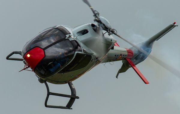 vehicle,aircraft,clouds,England,Sun,Canon