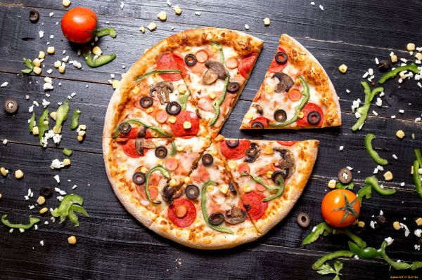 food,wooden surface,pizza,tomatoes,salami,vegetables