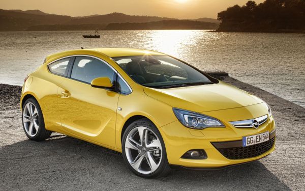 Opel,astra,GTC,kuning,tampilan samping