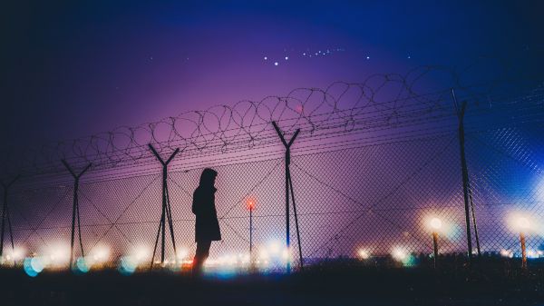 sunlight,night,sky,lightning,street light,barbed wire