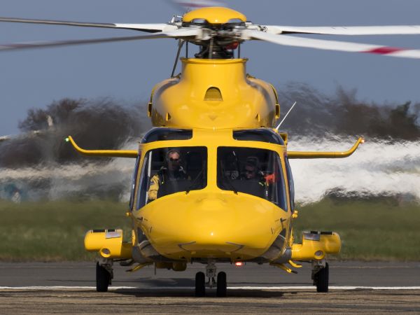 helicopter,helicopter rotor,aircraft,mode of transport,rotorcraft,yellow