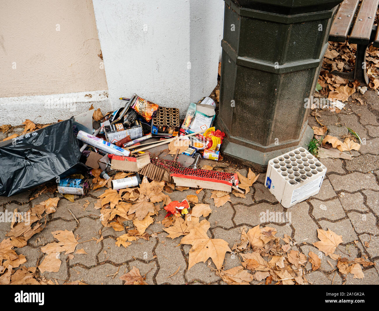 Paris, France - Jan 1, 2018: View from above of multiple fireworks and pyrotechnic devices near a a public waste bin after annual New year celebrations Stock Photo