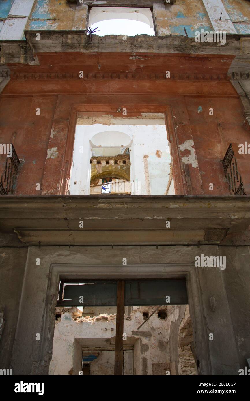 Derelict building with crumbling brickwork showing interior, Old Havana, Cuba Stock Photo