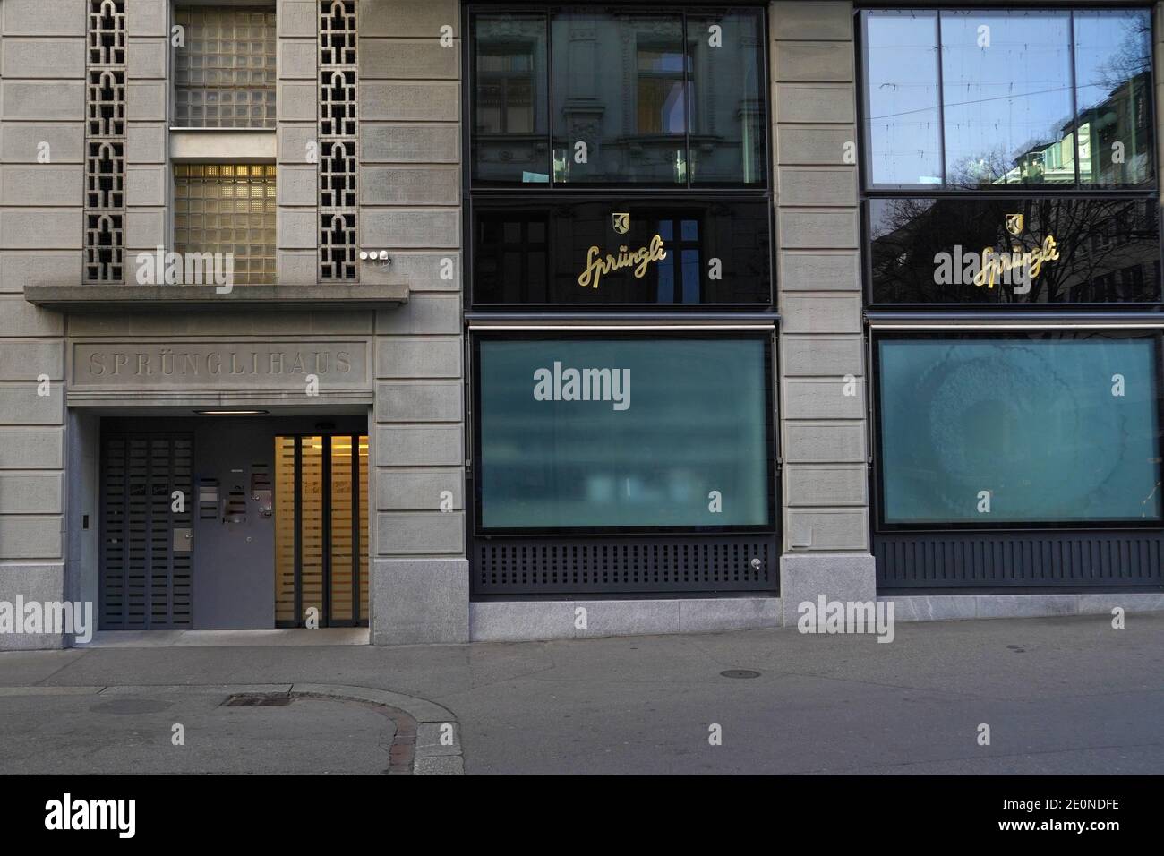 Logo of Sprungli, Swiss luxury confectionery manufacturer on the side wall of the building of the main store of this brand. Stock Photo