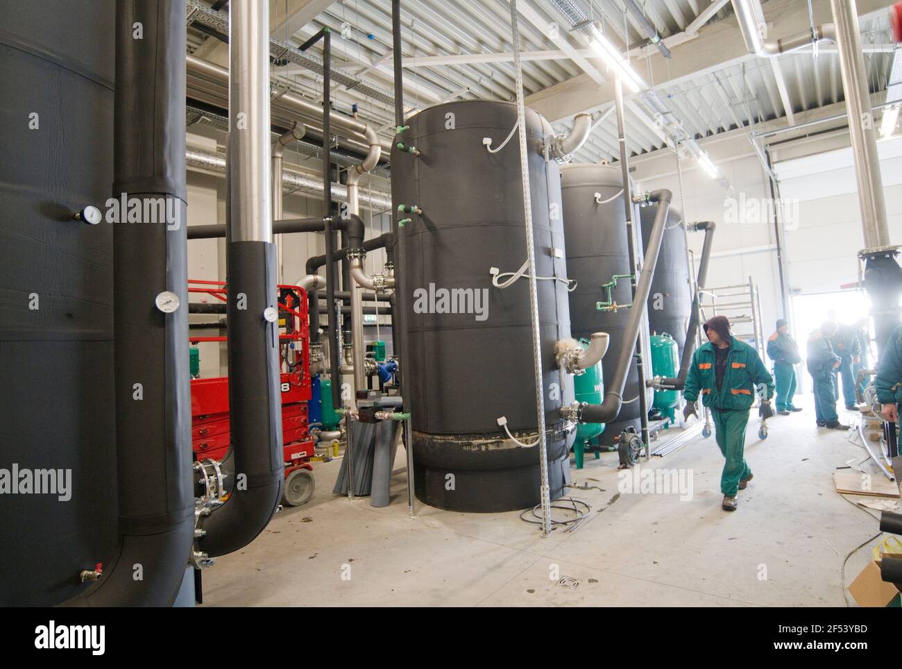 Sofia, Bulgaria - Mar 23 2021: Installing the supercomputer in Sofia Tech park - the biggest in Eastern Europe.Cooling system with workers. Stock Photo