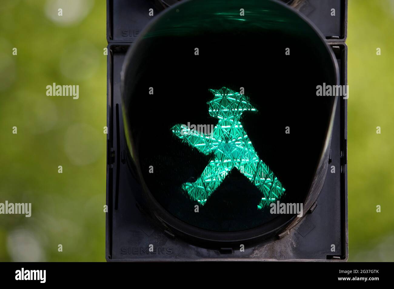 Pedestrian traffic light with green eastern traffic light man Galoppo by Karl Peglau, Berlin, Germany Stock Photo