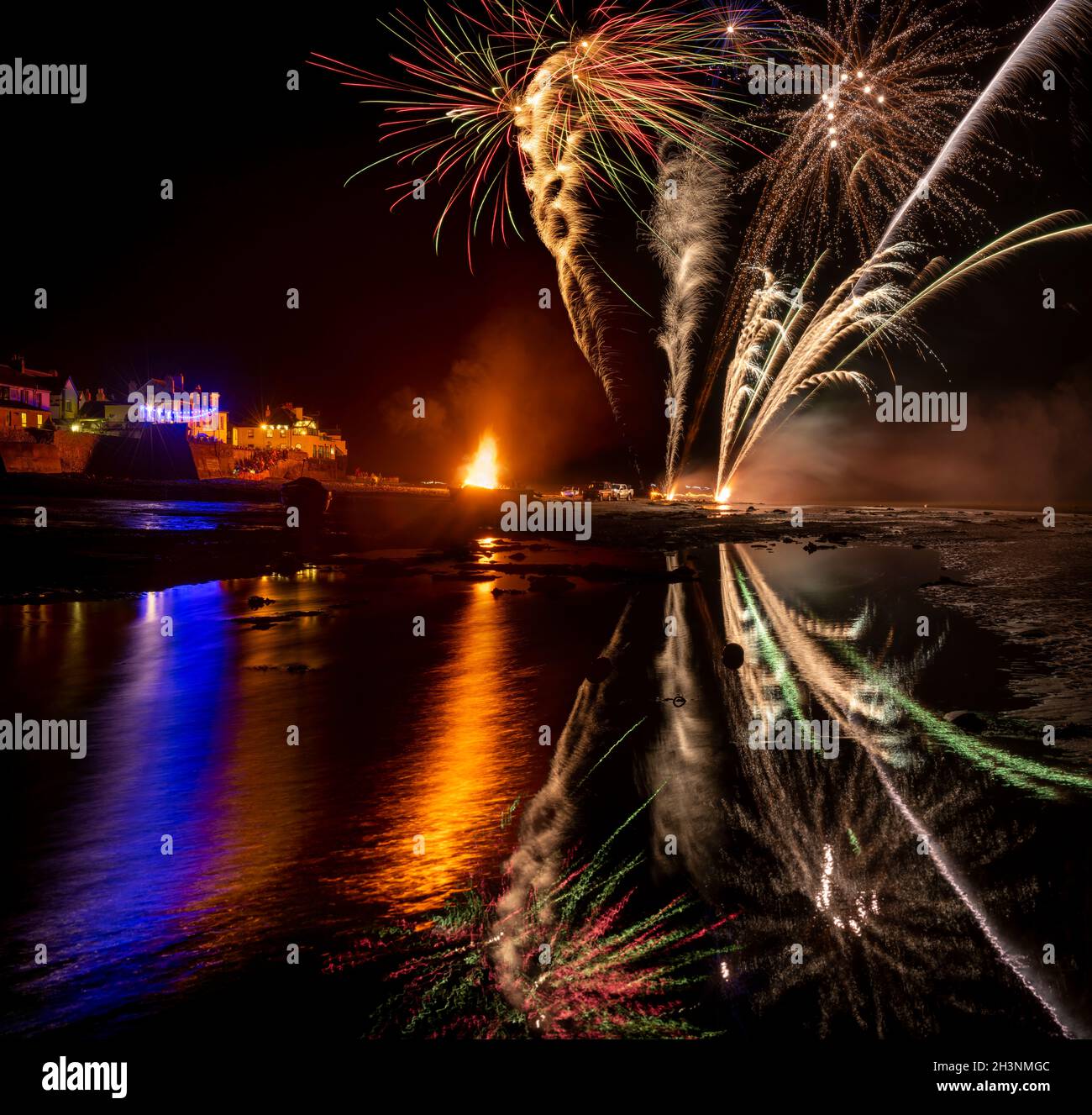 Appledore, North Devon, England. Friday 29th October 2021 - After a day of showers and heavy cloud, the rain holds off long enough for the annual Appledore Pirates charity Firework display to go ahead on the River Torridge estuary at Appledore in North Devon. Credit: Terry Mathews/Alamy Live News Stock Photo