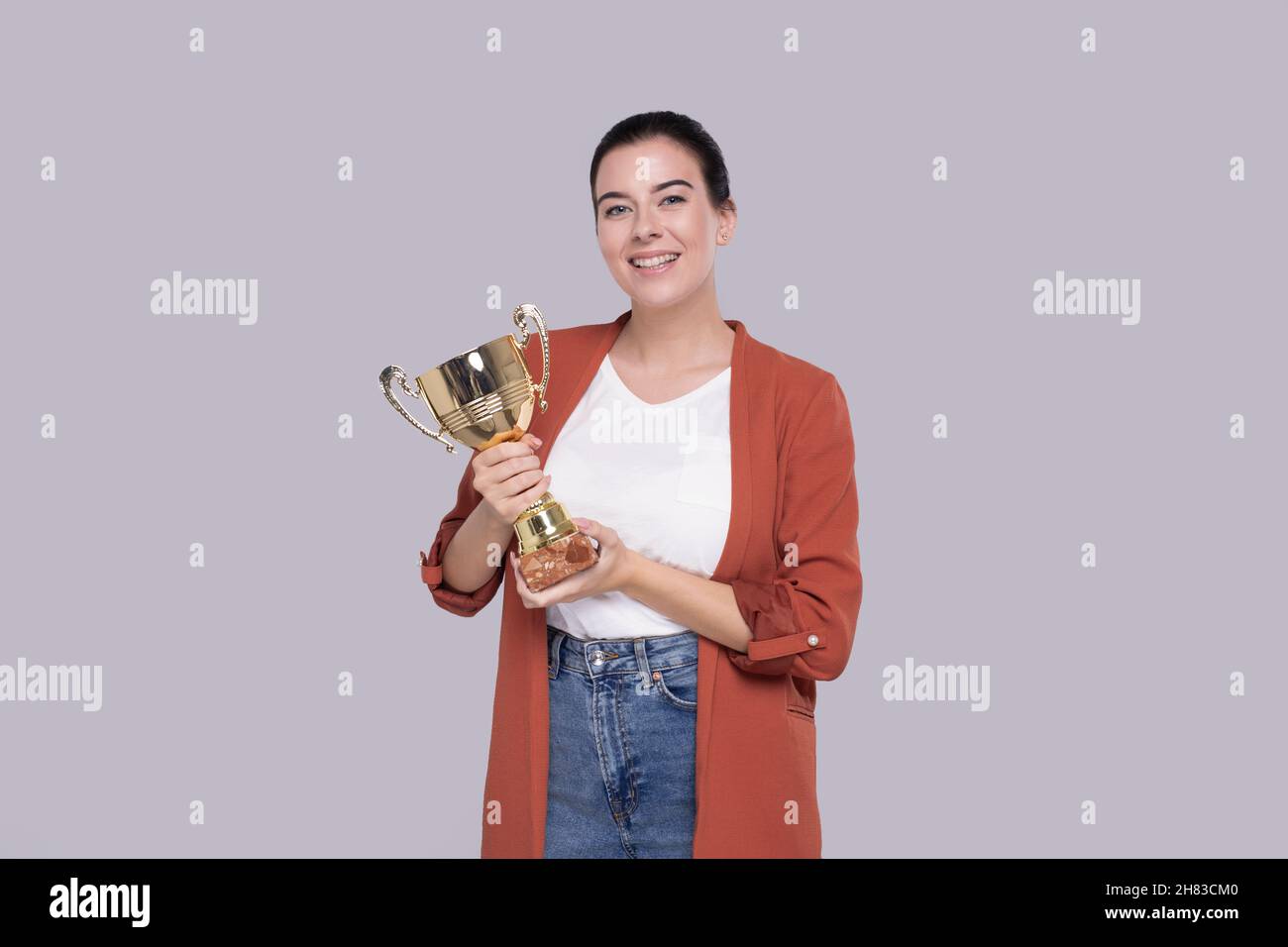 Girl Holding Trophy Happy Isolated. Girl Goals. Winner. Girl Smilling Stock Photo